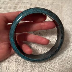 Black and turquoise plastic bracelet